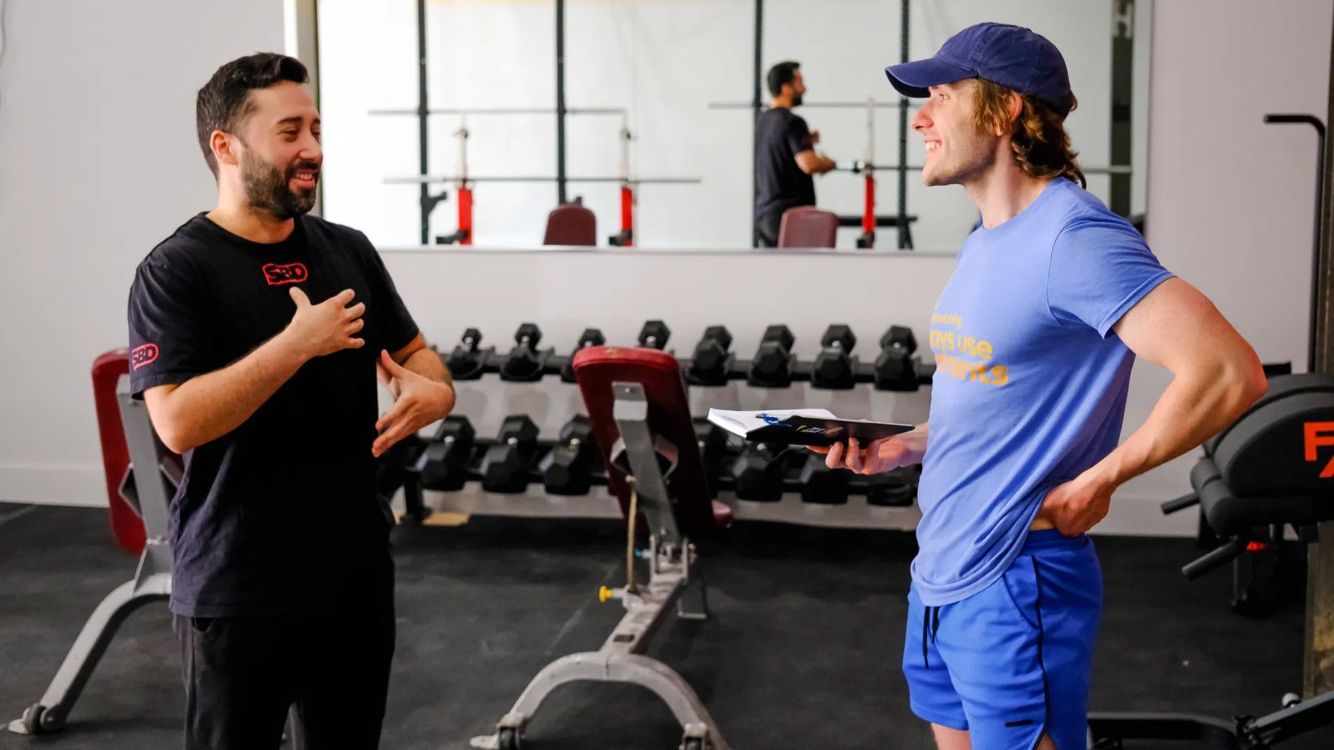 two mans talking to each other